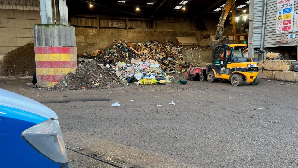 Bluebird Van disposing of waste at licensed recycling centre in Crowthorne