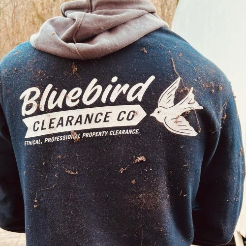 Bluebird clearance co team member with dusty branded workwear Camberley